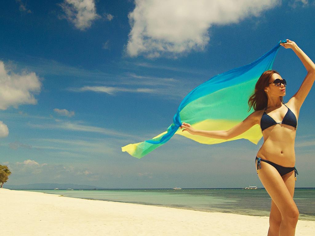 เซาท์ ปาล์ม รีสอร์ต Hotel ปางเลา ภายนอก รูปภาพ A woman wearing a sarong