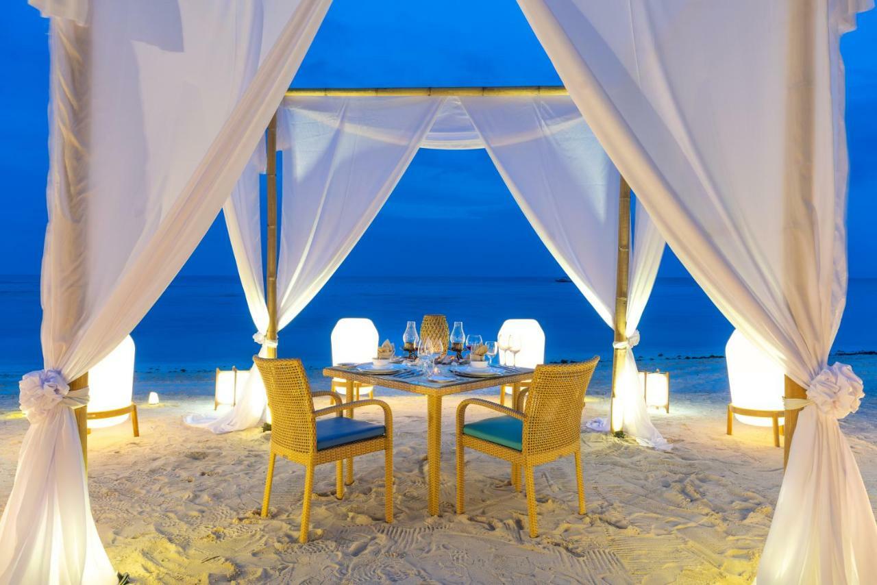 เซาท์ ปาล์ม รีสอร์ต Hotel ปางเลา ภายนอก รูปภาพ A beachside dining experience at the resort