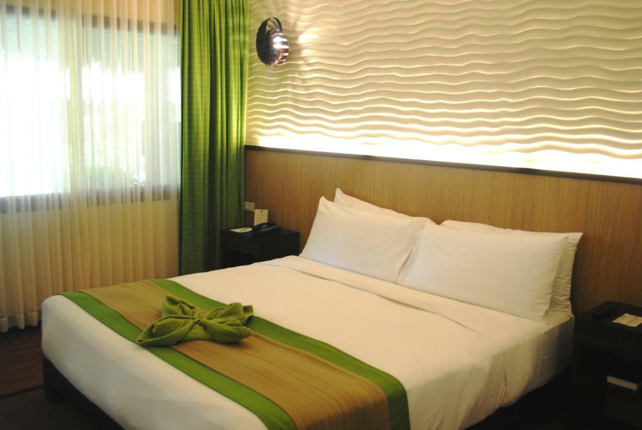เซาท์ ปาล์ม รีสอร์ต Hotel ปางเลา ภายนอก รูปภาพ A room at the hotel