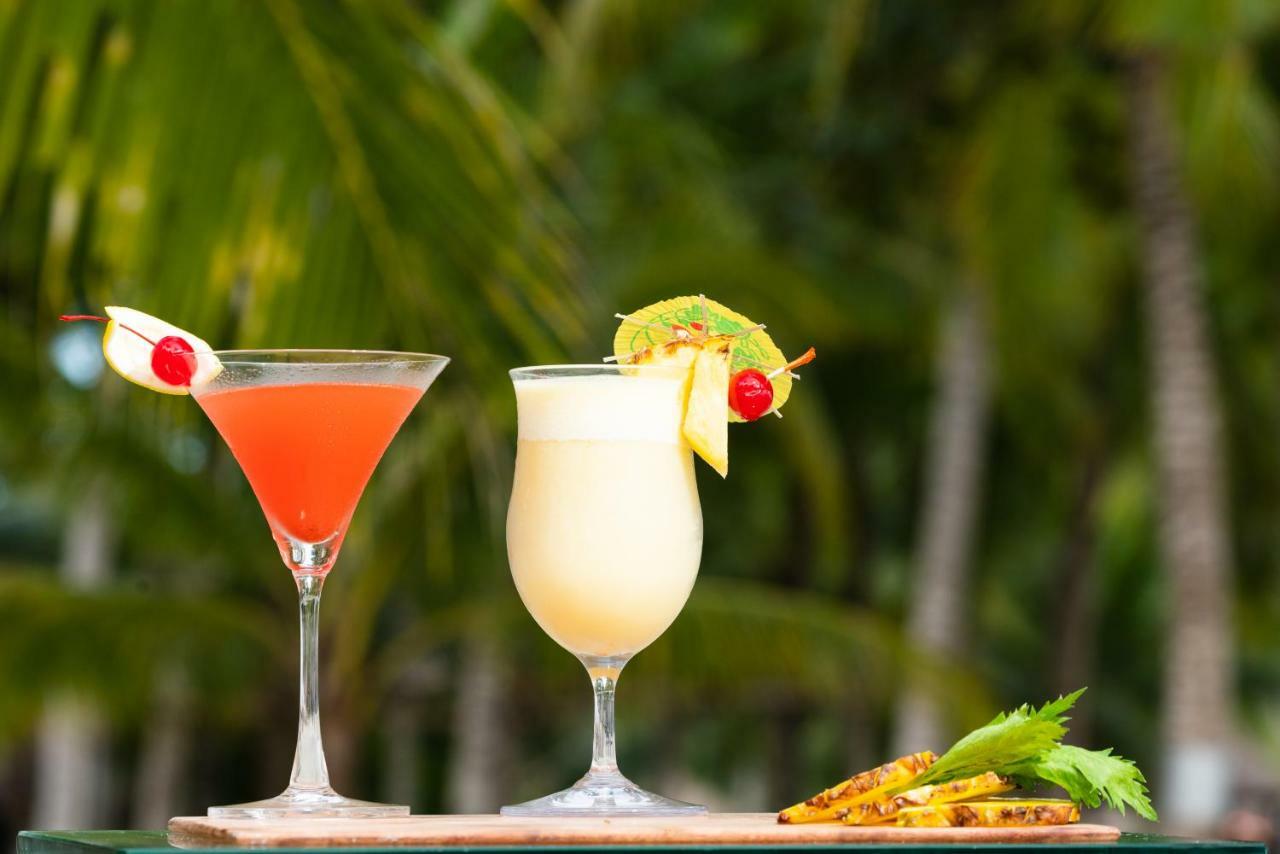 เซาท์ ปาล์ม รีสอร์ต Hotel ปางเลา ภายนอก รูปภาพ Two tropical drinks