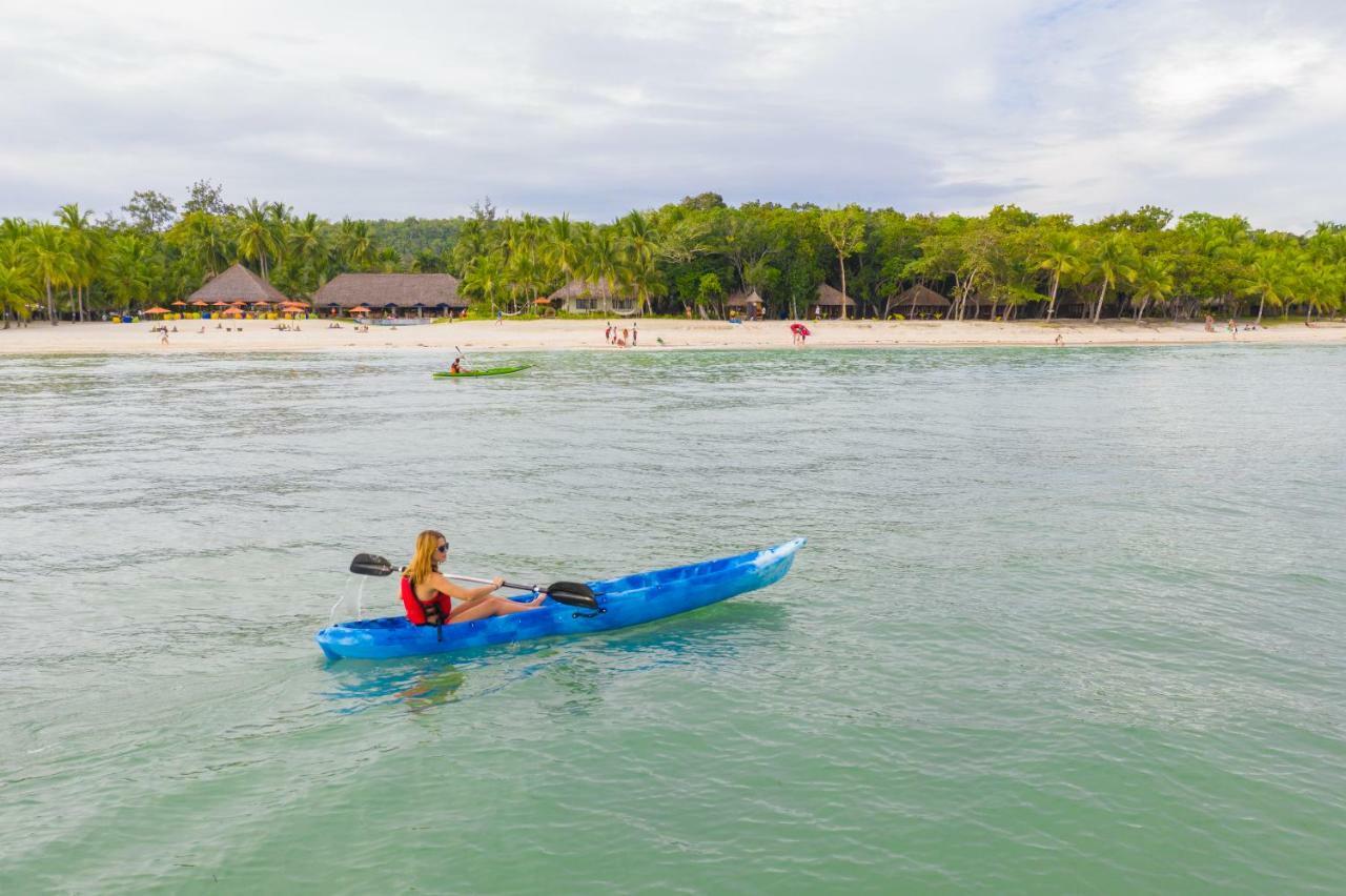 เซาท์ ปาล์ม รีสอร์ต Hotel ปางเลา ภายนอก รูปภาพ Kayaking at the beach