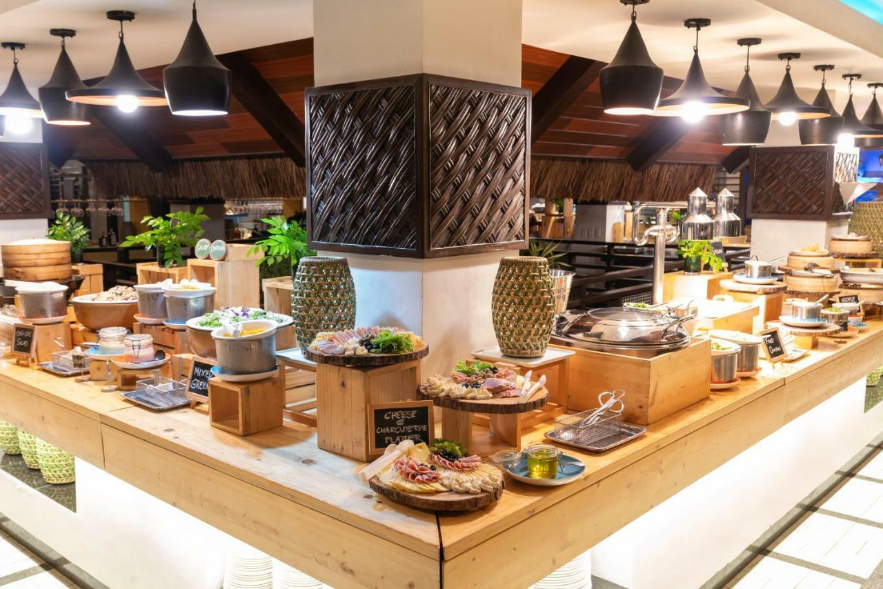 เซาท์ ปาล์ม รีสอร์ต Hotel ปางเลา ภายนอก รูปภาพ A buffet at a hotel
